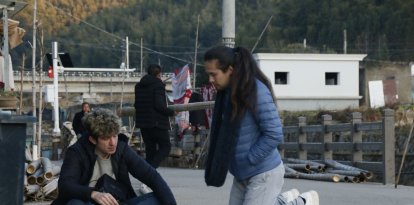 Guxens con el actor Junyi Sun.