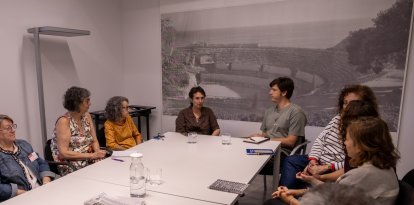 La reunión de trabajo.