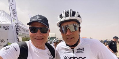 August Pascual junto a Miguel Induráin, en la edición de 2025 de la Titan Desert.