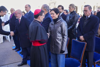 La presidenta de la Comunidad de Madrid, Isabel Díaz Ayuso, a su llegada a la eucaristía por la festividad de la Virgen de la Almudena