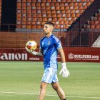 Dani Rebollo, esta temporada durante un calentamiento prepartido en el Nou Estadi.