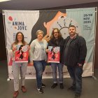 Los organizadores y el autor del cartel oficial del festival.