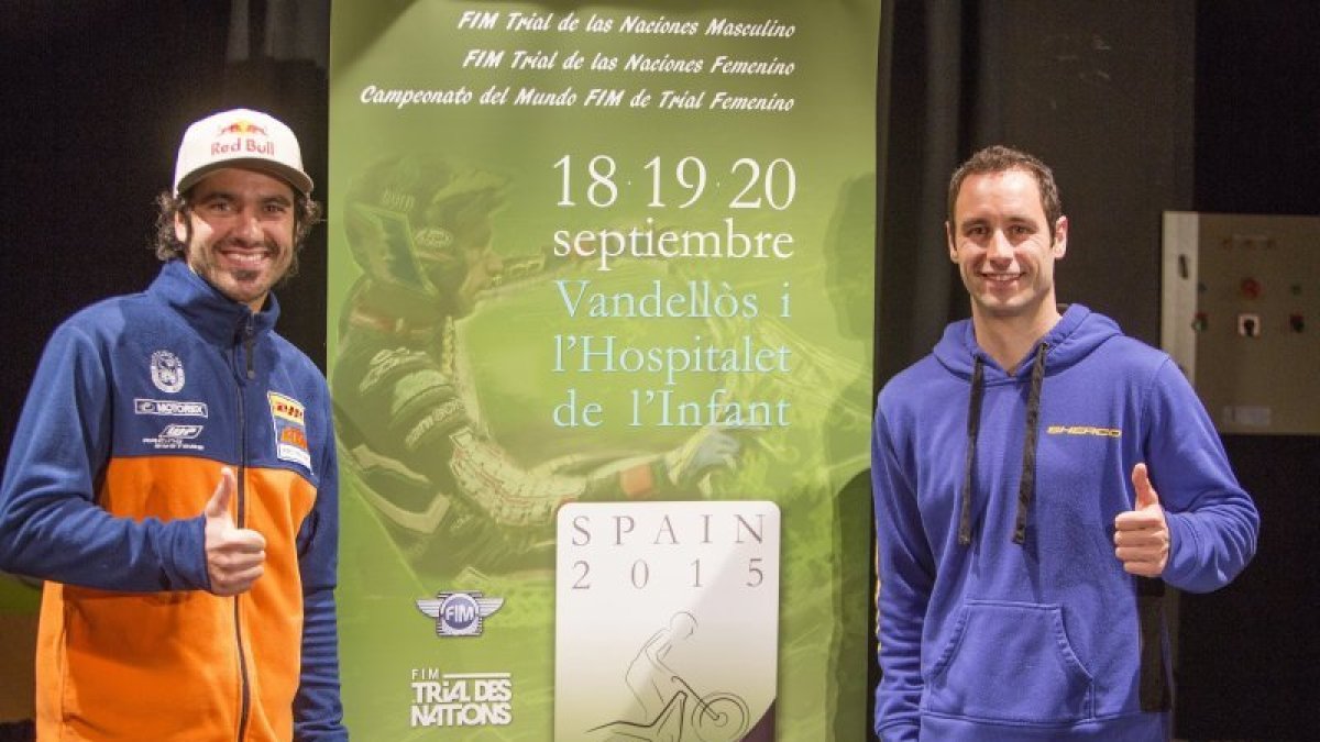 Iván Cervantes y Albert Cabestany, junto al cartel promocional del evento.