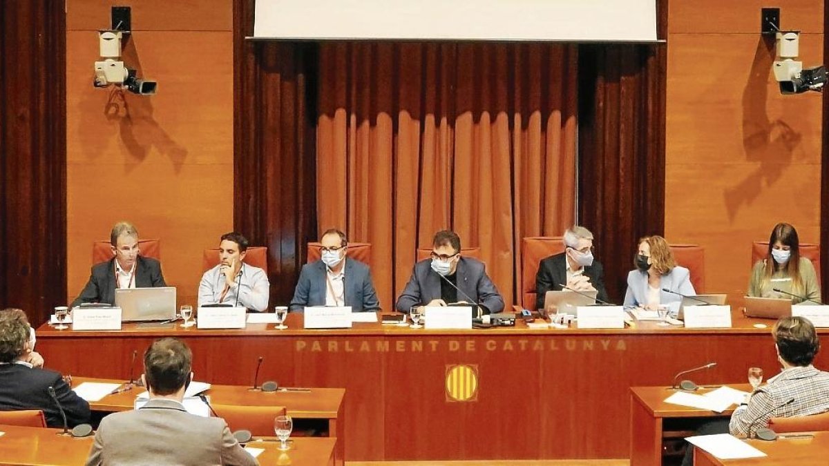 Albert Pons, Josep Llambrich i Jordi Marcel Matamoros durant la seua intervenció.