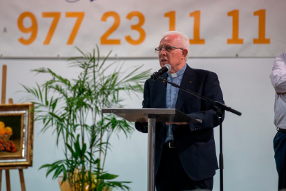 El padre Mario Buonanno durante un momento de la cena.